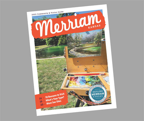 A cover of the 2023 Merriam Visitor Guide - a close up of a canvas and paint with a pond in the background.