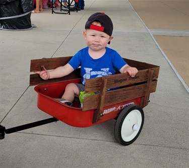 Cutest boy in wagon