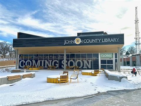 Merriam Plaza Library exterior front on a snowy day.