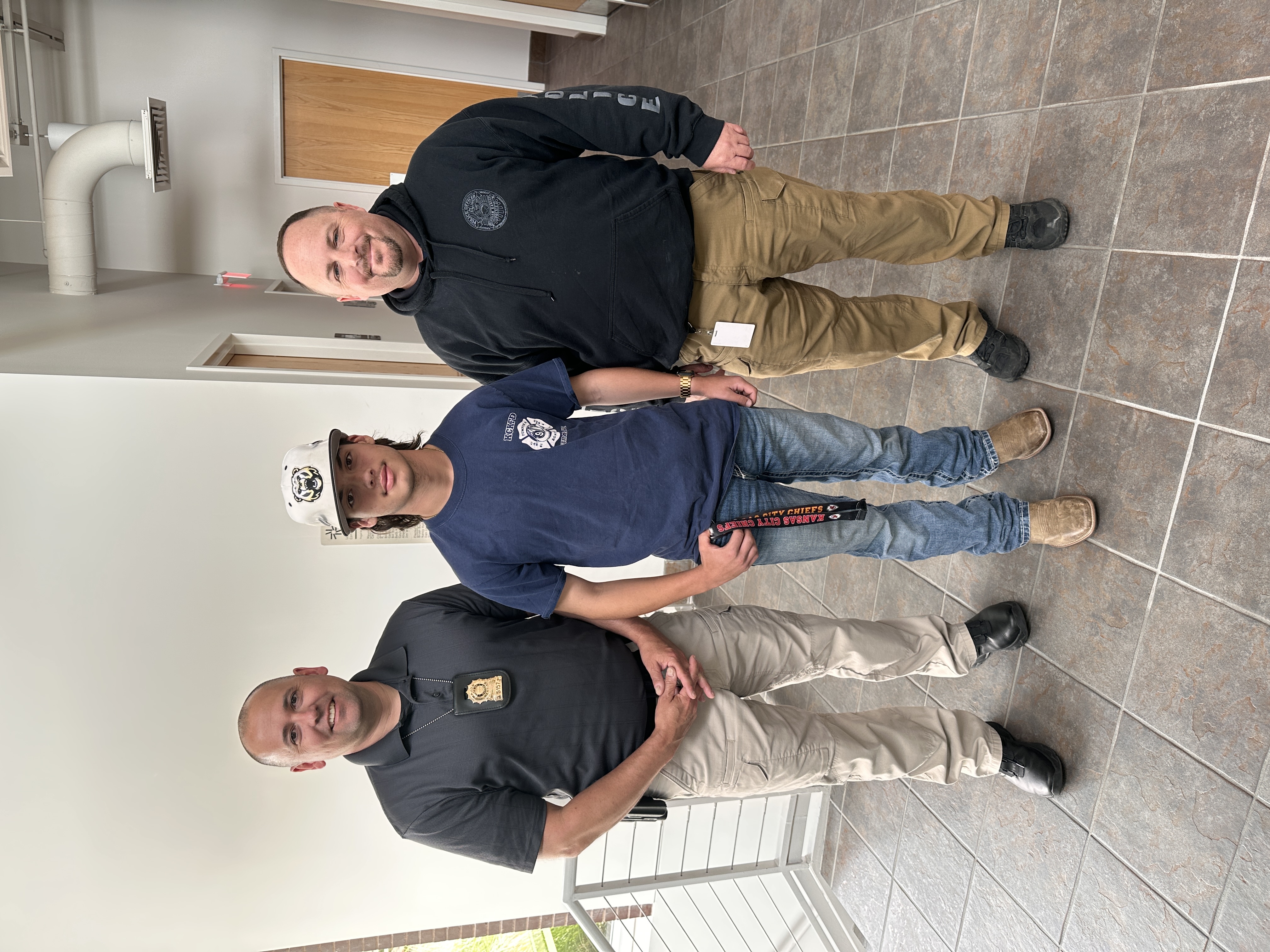 Kadien with Maj. Brokaw and Capt. Waters.