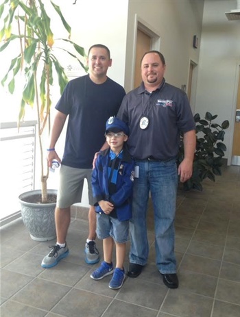 Kadien with Maj. Brokaw and Capt. Waters.