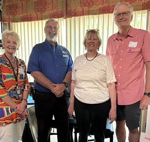 Edelweiss historian Pat Meads, Mayor Bob Pape, and City Councilmembers Christine Evans Hands and Bruce Kahdahl pose at the celebration.