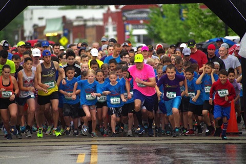 Runners take off from the start line at the Turkey Creek Festival 5k 
